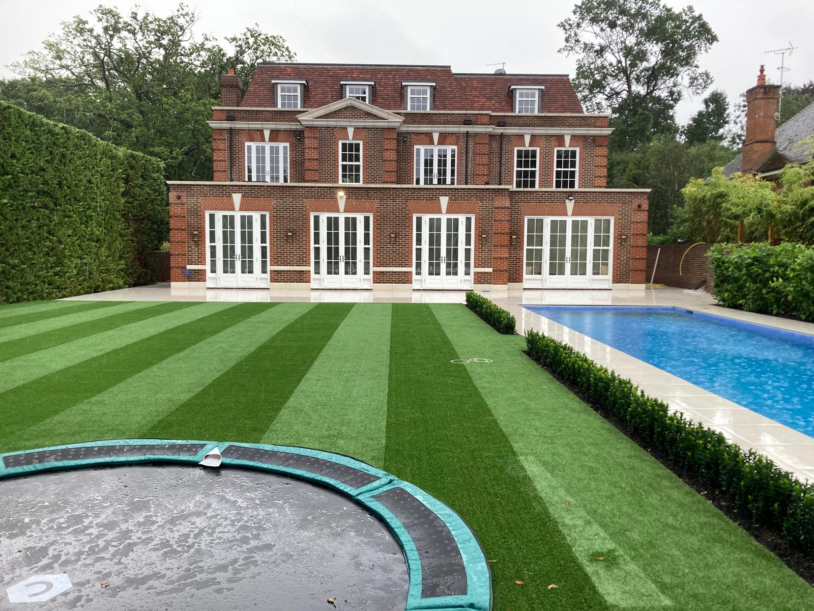 Completed house with finished garden, pool and trampoline